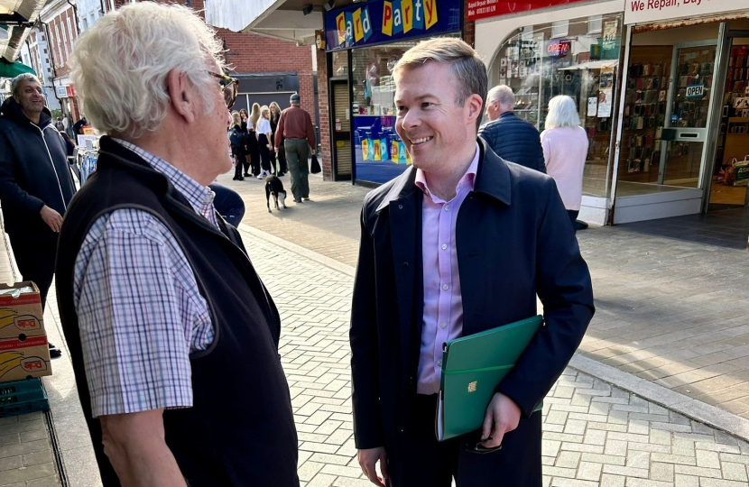 Bradley with a local resident on Bromsgrove High Street