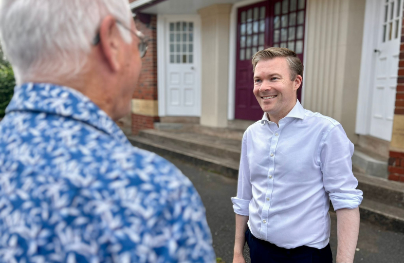 Bradley with a local resident.