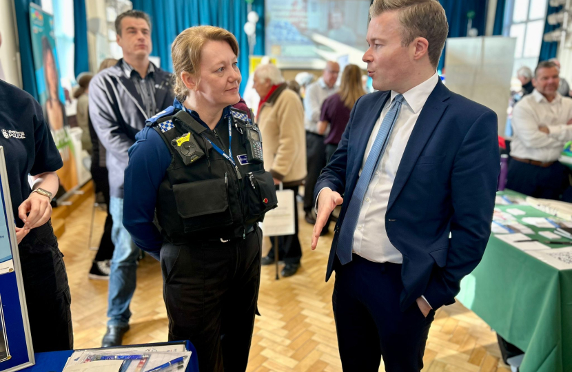 Bradley with a local police officer