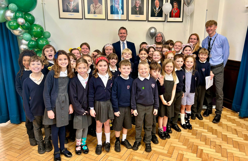 Bradley with the choir from Lickey End First School