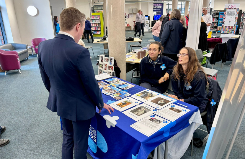 Bradley with representatives from the Blue Cross