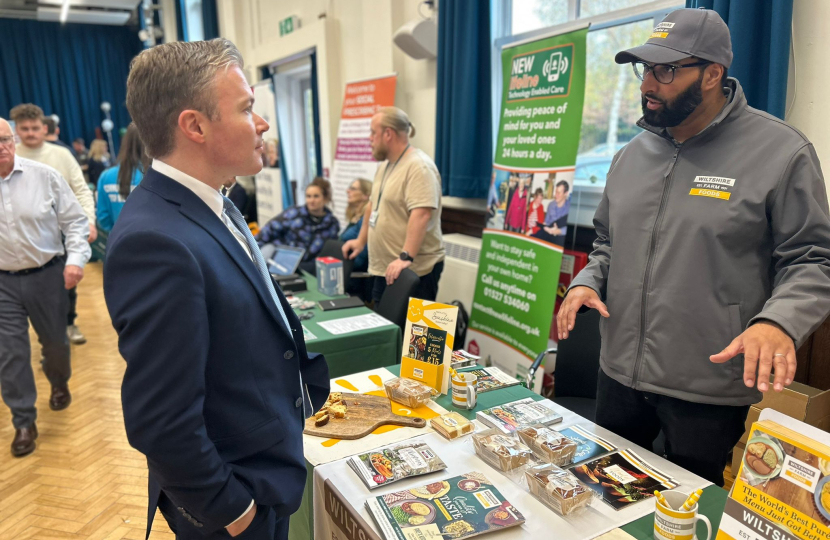 Bradley with a representative from Wiltshire Farm Foods