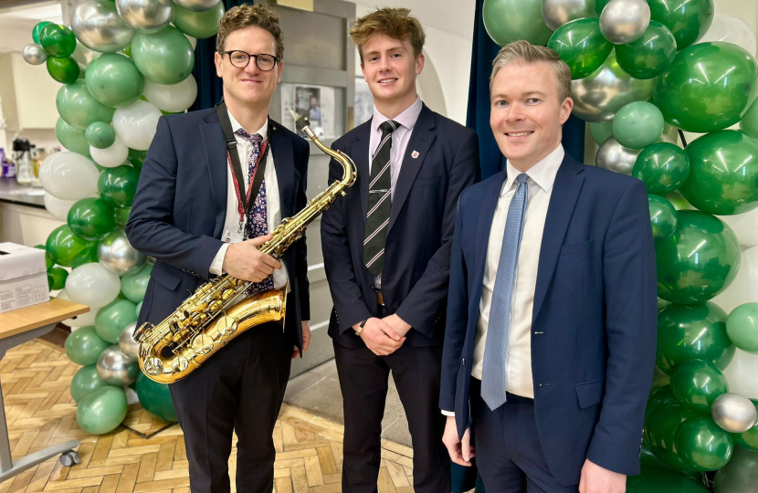 Bradley with representatives from Bromsgrove School