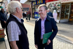 Bradley with a local resident on Bromsgrove High Street