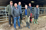 Bradley with local farmers