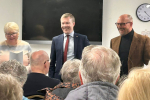 Bradley and Cllr Adam Kent with local residents