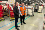 Bradley visiting the Royal Mail's Bromsgrove Delivery Office