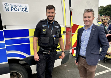 Bradley with a police officer.