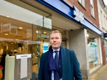 Bradley outside Halifax's Bromsgrove branch.