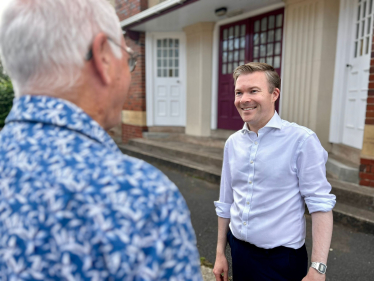 Bradley with a local resident.