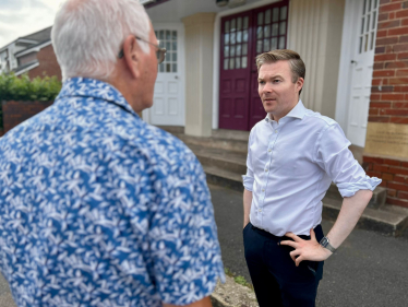 Bradley with a local resident.