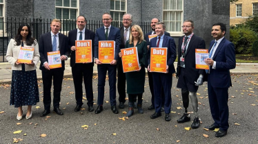 Bradley with colleagues at Number 10 Downing Street.